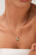 Altın Katmanlı kabuk formu ve kristal taş detaylı 925 ayar gümüş kolye 124