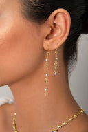 Altın Uzun ve sallantılı kristal taş detaylı  925 ayar gümüş küpe 34